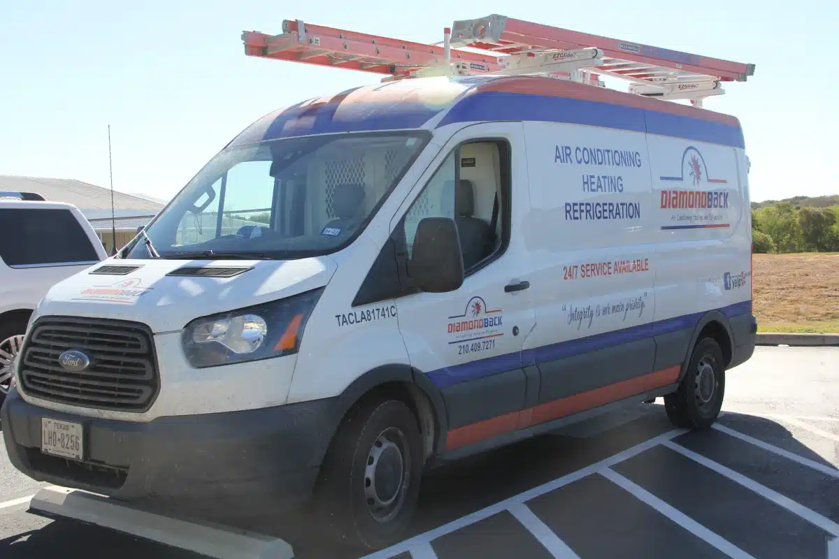Truck owned by Diamondback AC with ladder on top
